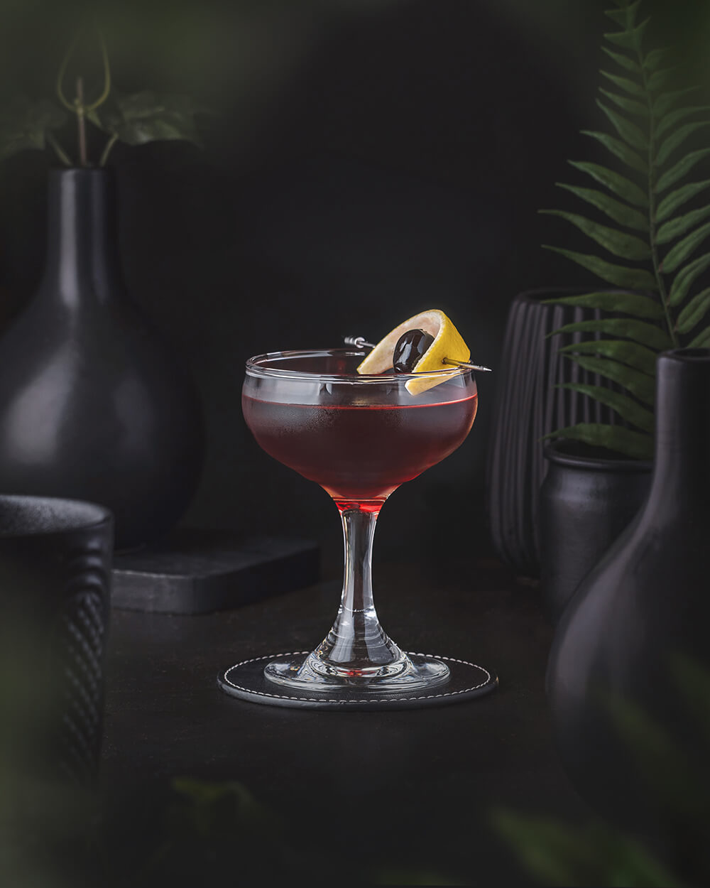 Bobby Burns - Deep red short drink made with blended scotch, sweet vermouth and benedictine. Garnished with a maraschino cherry or lemon zest.