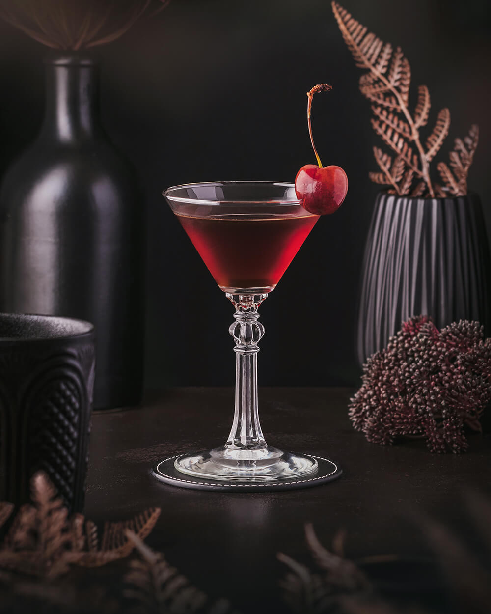 Remember the Maine - Manhattan twist with absinthe and cherry. Deep red cocktail with a cherry garnish.